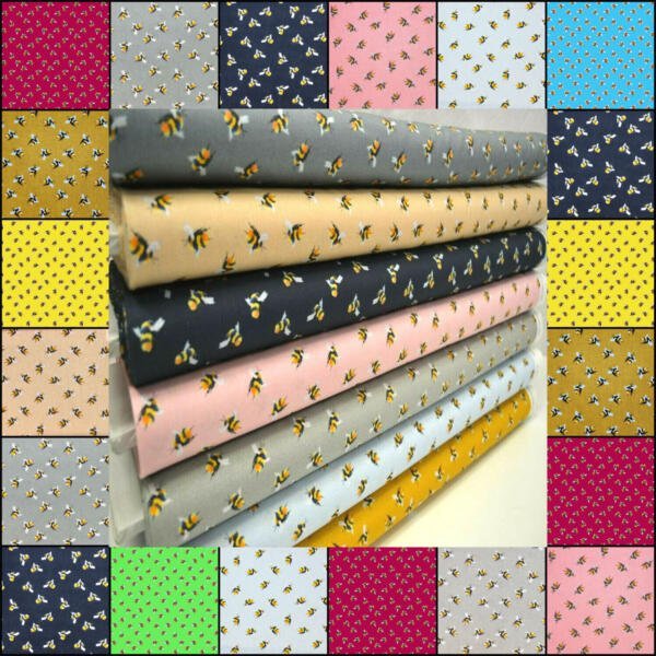 A collection of colorful fabric samples arranged in a grid pattern, each featuring a bee print. The center shows eight folded fabrics in various colors including gray, pink, yellow, and blue. The outer border consists of 24 square fabric samples, each with tiny bee motifs.