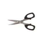 A pair of stainless steel scissors with black plastic handles. The blades are sharp and angled, ready for cutting. The scissors are positioned against a white background with the handles on the right side and the blades pointing to the left.