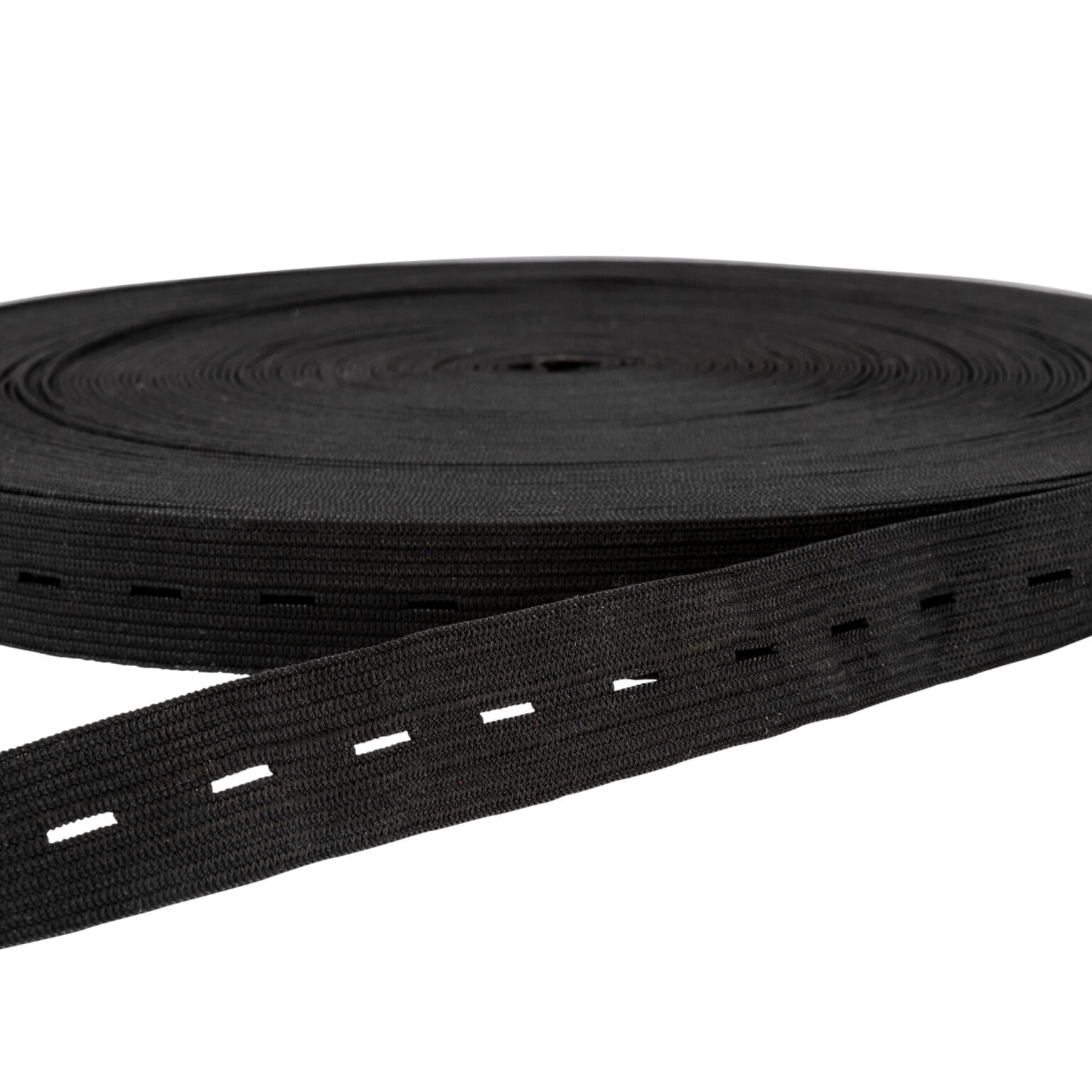 A rolled-up black nylon webbing with evenly spaced rectangular holes along its length. The webbing is coiled in a large loop with a portion extending towards the right.