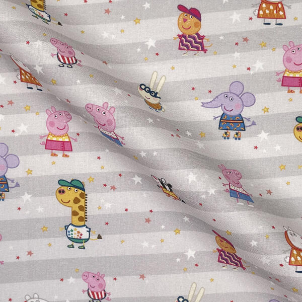 A piece of gray fabric featuring stripes and a whimsical pattern of various cartoon animals. The animals, including a pig, giraffe, rabbit, and elephant, are dressed in colorful clothing, standing amidst tiny stars scattered across the fabric.