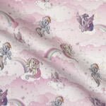 A fabric with a light pink background features colorful ponies with wings, rainbows, clouds, crescent moons, hearts, and castles. The ponies are in various poses and have wings and different mane colors. The scene is whimsical and childlike.
