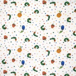 A patterned fabric featuring illustrations of caterpillars, apples, plums, and oranges, interspersed with colorful polka dots on a white background. The design is playful and vibrant, evoking a children's theme.