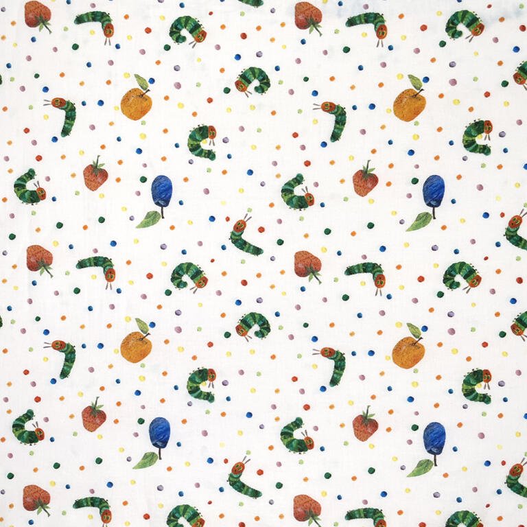 A patterned fabric featuring illustrations of caterpillars, apples, plums, and oranges, interspersed with colorful polka dots on a white background. The design is playful and vibrant, evoking a children's theme.