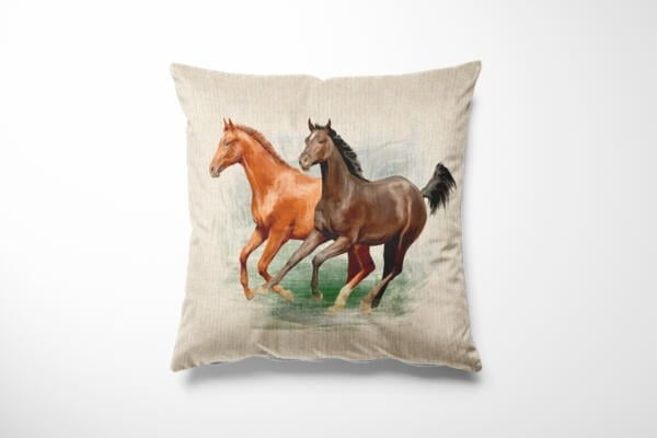 A beige throw pillow features a detailed painting of two horses in motion. One horse is brown, and the other is chestnut, and they are depicted running side by side on a grassy plain. The background of the pillow is plain, emphasizing the horse illustration.