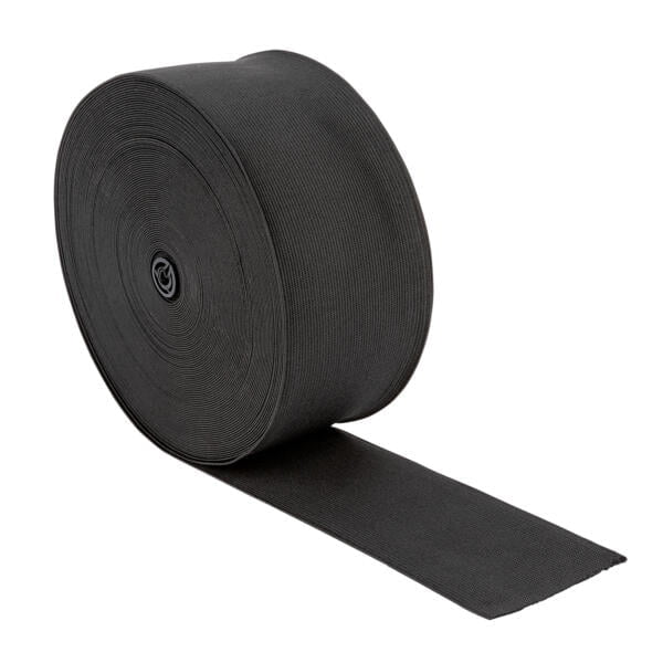 A large roll of black elastic bandage tape is partially unrolled on a white background. The roll has a cylindrical shape with a wide band, showing the tightly wound layers of the elastic material.