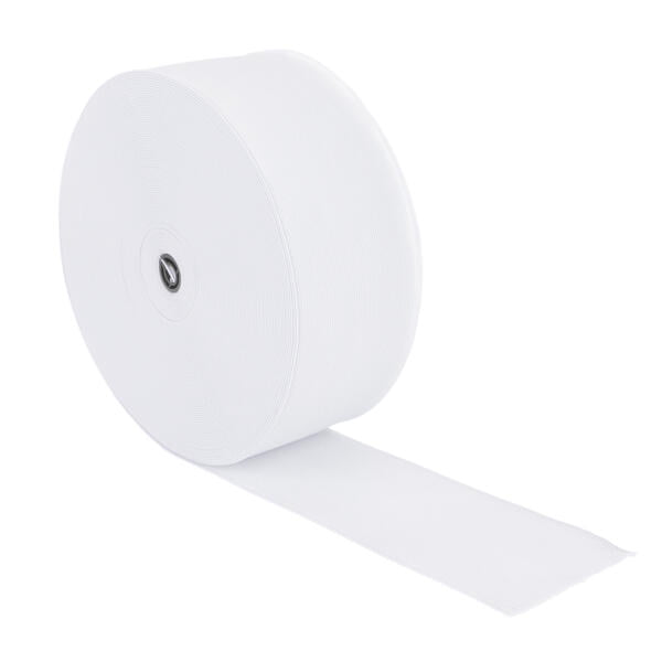 A large roll of white elastic band, partially unrolled, showing the width and texture of the material. The band has a smooth surface with evenly spaced horizontal lines, and a metallic core is visible at the center of the roll.