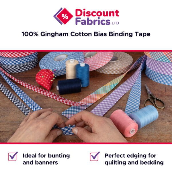 A display of various rolls of gingham cotton bias binding tape in different colors, with hands arranging the tapes. There are spools of thread and a pin cushion. Text: "Discount Fabrics Ltd, 100% Gingham Cotton Bias Binding Tape, Ideal for bunting and banners, Perfect edging for quilting and bedding.