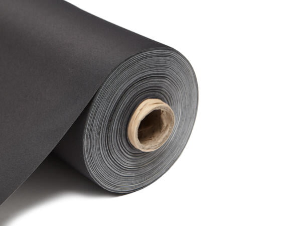 This image shows a roll of blackout lining fabric. The fabric is neatly rolled around a central cardboard tube, revealing multiple layers tightly wound together. The fabric has a smooth, matte finish and is displayed on a clean, white background that emphasizes its uniform color and texture. The edge of the roll is cleanly cut, highlighting the fabric's thickness and durability. The colour of this lining is black
