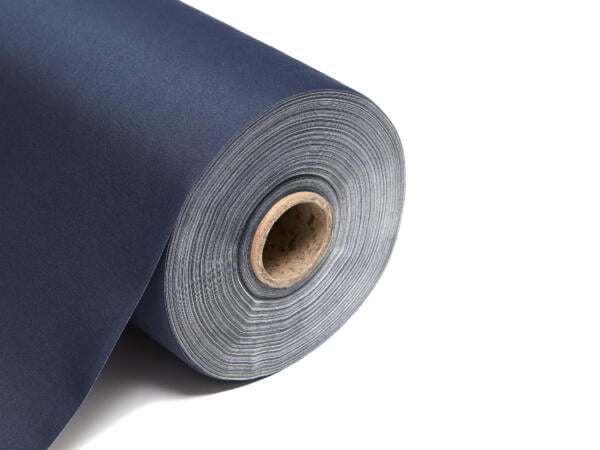 This image shows a roll of blackout lining fabric. The fabric is neatly rolled around a central cardboard tube, revealing multiple layers tightly wound together. The fabric has a smooth, matte finish and is displayed on a clean, white background that emphasizes its uniform color and texture. The edge of the roll is cleanly cut, highlighting the fabric's thickness and durability. The colour of this lining is navy