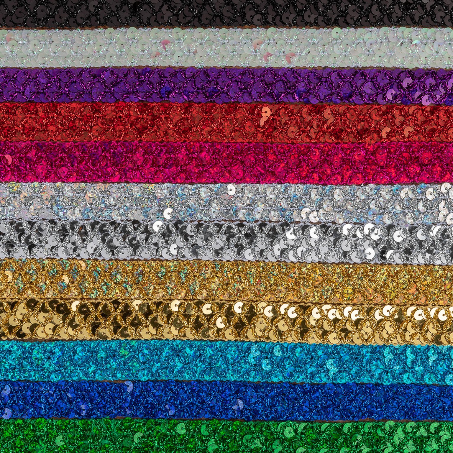 Rows of sequin fabric in various colors, including black, silver, purple, red, pink, white, gold, yellow, green, teal, and blue. The sequins create a sparkling effect, with each row showcasing a different vibrant hue.