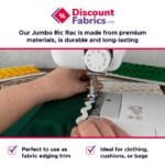A person sewing white jumbo ric rac onto green fabric using a sewing machine. The text reads, "Discount Fabrics LTD. Our Jumbo Ric Rac is made from premium materials, is durable and long-lasting. Perfect to use as fabric edging trim. Ideal for clothing, cushions, or bags.