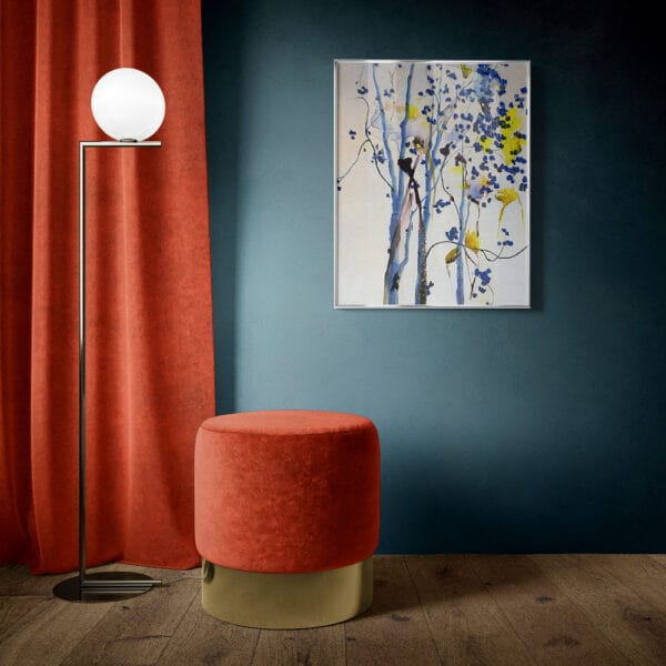 A modern interior with a teal wall, showcasing a floor lamp with a round white bulb, an abstract painting in blue and yellow accents, and a stool crafted from plush Super Velvet Fabric in red on a light wood floor beside vibrant red curtains.