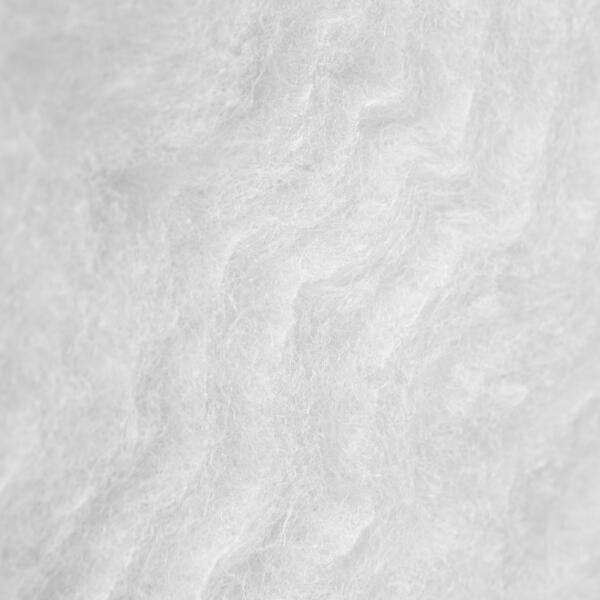 Close-up image of a textured, white fibrous material, showing a soft, fluffy surface with irregular, wavy patterns. The overall appearance resembles wool or cotton.