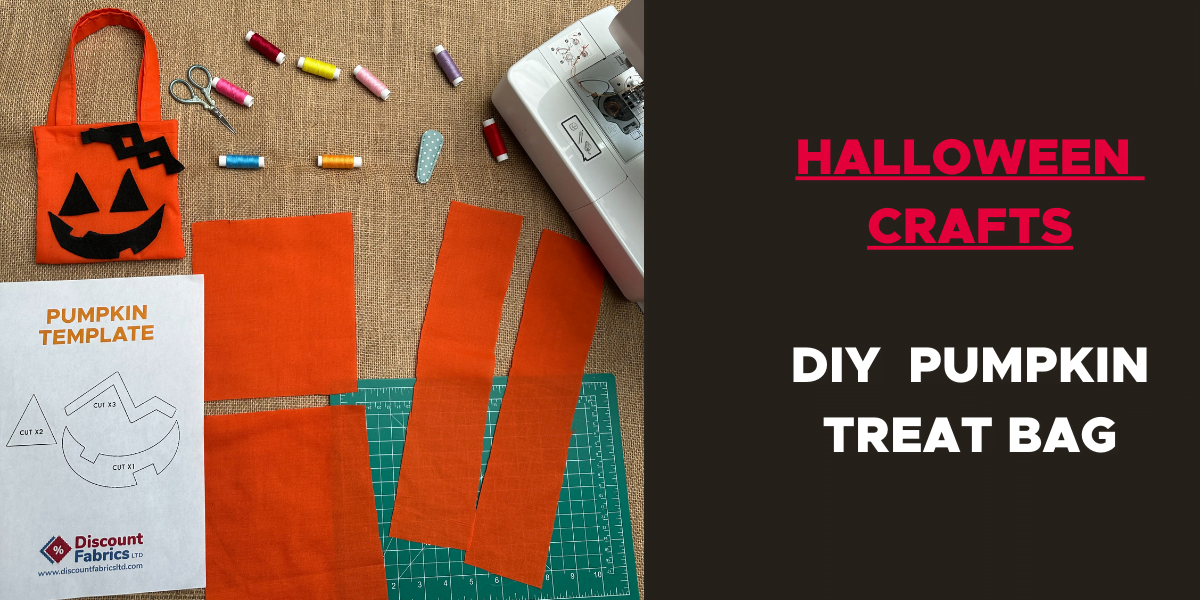 An image showing materials for a DIY pumpkin treat bag project. Items include fabric pieces, a sewing machine, spools of thread, scissors, a seam ripper, and a cut-out pumpkin template. The text reads: "Halloween Crafts" and "DIY Pumpkin Treat Bag.