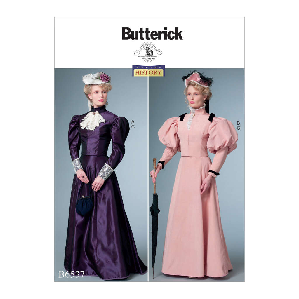 Butterick pattern B6537 cover featuring two women in historical costumes. The left woman wears a dark purple gown with puffed sleeves, lace details, and a white hat. The right woman wears a light pink gown with puffed sleeves and a darker hat, holding an umbrella.