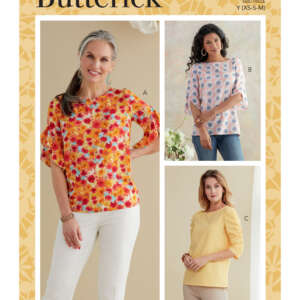 Butterick sewing pattern B6687 showcases three women's blouse designs. View A features a floral print top with ruffle sleeves, View B has a geometric print with wide sleeves, and View C presents a solid yellow top with gathered sleeves.