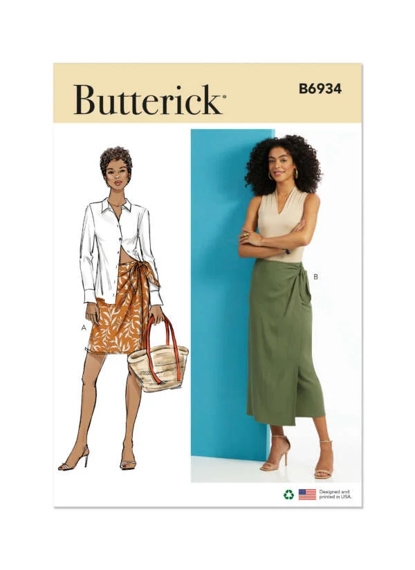 Pattern cover for Butterick B6934. It features two women modeling different outfits. The left model wears a white blouse with a brown skirt and carries a handbag. The right model stands with her arms crossed, wearing a beige top and a green skirt.