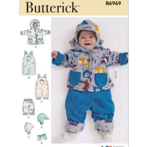 Pattern cover for Butterick B6969 featuring a baby in a blue coordinated outfit with a bear and forest print hoodie, and matching blue pants. The pattern includes designs for a hoodie, overalls, romper, hat, and stuffed toy.