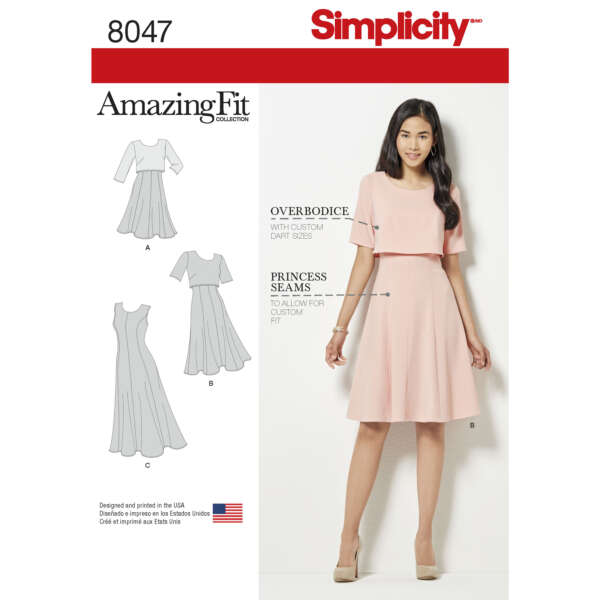 Pattern envelope for Simplicity 8047 from the Amazing Fit Collection, featuring a model in a knee-length, short-sleeve pink dress with overbodice and princess seams. The envelope includes illustrations of the same dress in different views.