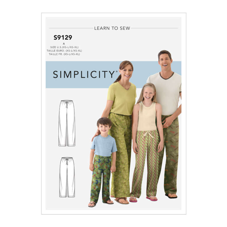 A sewing pattern cover titled "Simplicity S9129" for pajama pants in US sizes XS-XL. It features a smiling family of four, all dressed in different patterned pajama pants. The layout also includes front and back illustrations of the pajama pants design. Text: "Learn to Sew.