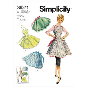 A Simplicity sewing pattern for vintage 1950s aprons labeled S9311. The pattern includes illustrations of a woman wearing a striped apron, along with three other apron designs: green with a sweetheart neckline, green with a scalloped edge, and blue plaid.