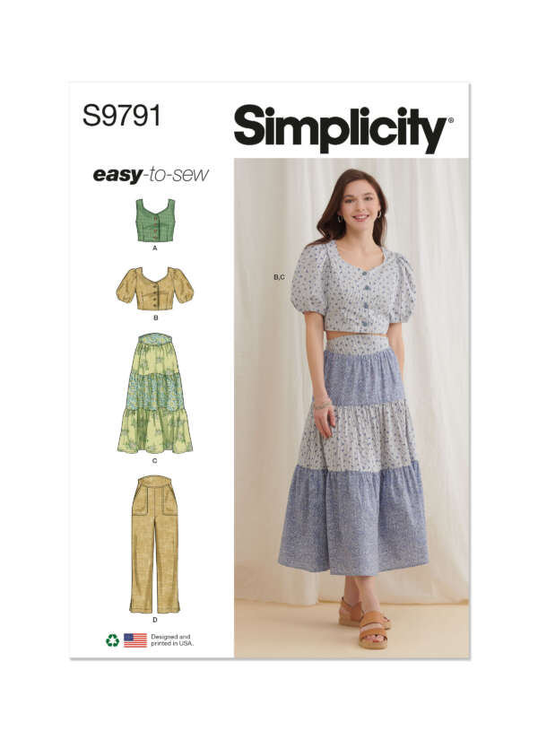 Simplicity S9791 pattern cover showing a woman wearing a blue tiered skirt and crop top. Illustrated options include two crop tops (one with puff sleeves), two multi-layered skirts, and pants. Labeled "easy-to-sew" with recycling symbol and USA origin note.