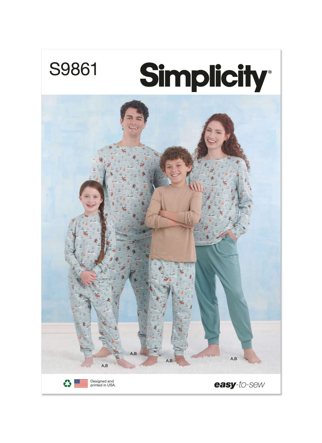Cover image of a Simplicity sewing pattern S9861 for family pajama sets. The image shows two adults and two children wearing matching pajama sets with playful patterns. The text "easy-to-sew" and "Designed and printed in USA" appears at the bottom.