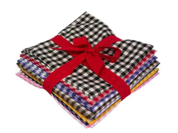 A neatly stacked bundle of colorful checkered fabric pieces, tied together with a red ribbon. The top fabric features a classic black and white checkered pattern. The other fabrics in the stack vary in colors.