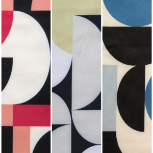 A triptych of abstract geometric art prints. The left panel has red, black, and white curved shapes. The middle panel features white, black, and light yellow curved forms. The right panel displays black, white, blue, and light gray circular and semi-circular patterns.