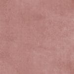 A close-up of soft, plush pink carpet with a smooth texture, filling the entire frame.