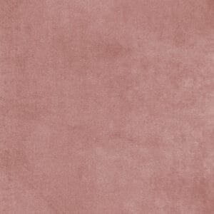 A close-up of soft, plush pink carpet with a smooth texture, filling the entire frame.