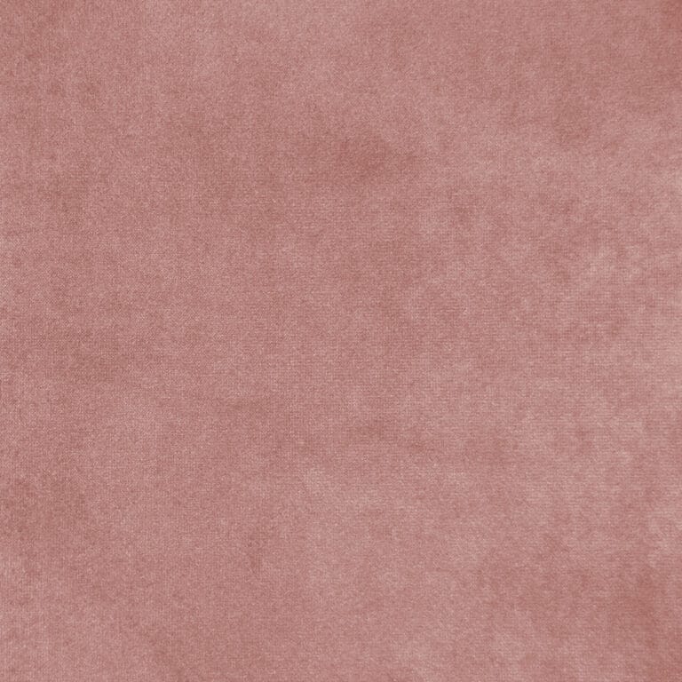 A close-up of soft, plush pink carpet with a smooth texture, filling the entire frame.