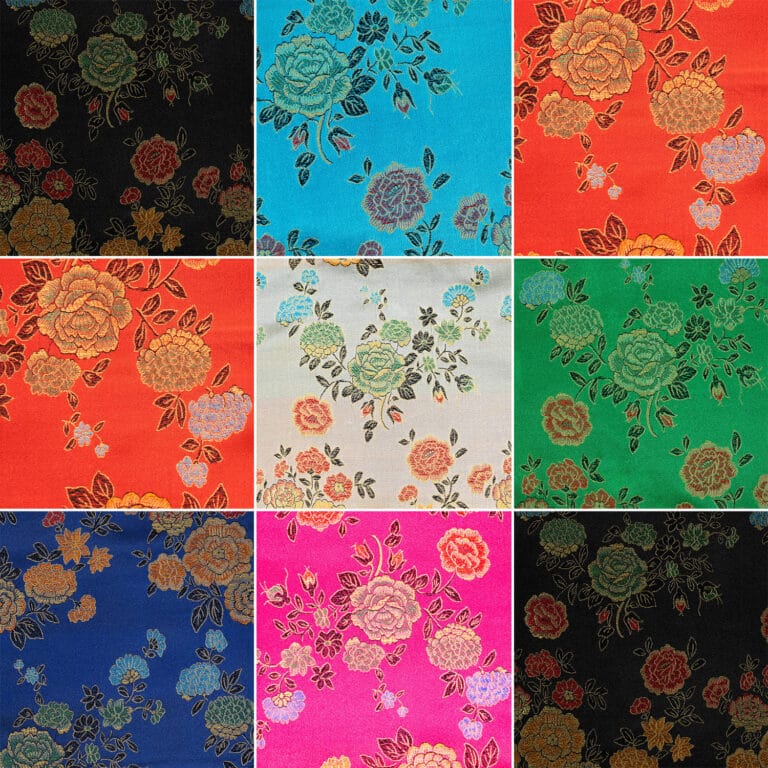 A collage of nine square fabric swatches, each showcasing intricate floral patterns. The swatches feature vibrant colors: black, blue, orange, pink, and green backgrounds with multicolored flowers, including roses and leaves.