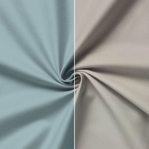 Close-up of two fabric swatches side by side, meeting in the center with a gathered twist. The left fabric is a muted teal color, and the right fabric is a soft beige. Both have a smooth texture, highlighting the folds and shadows.