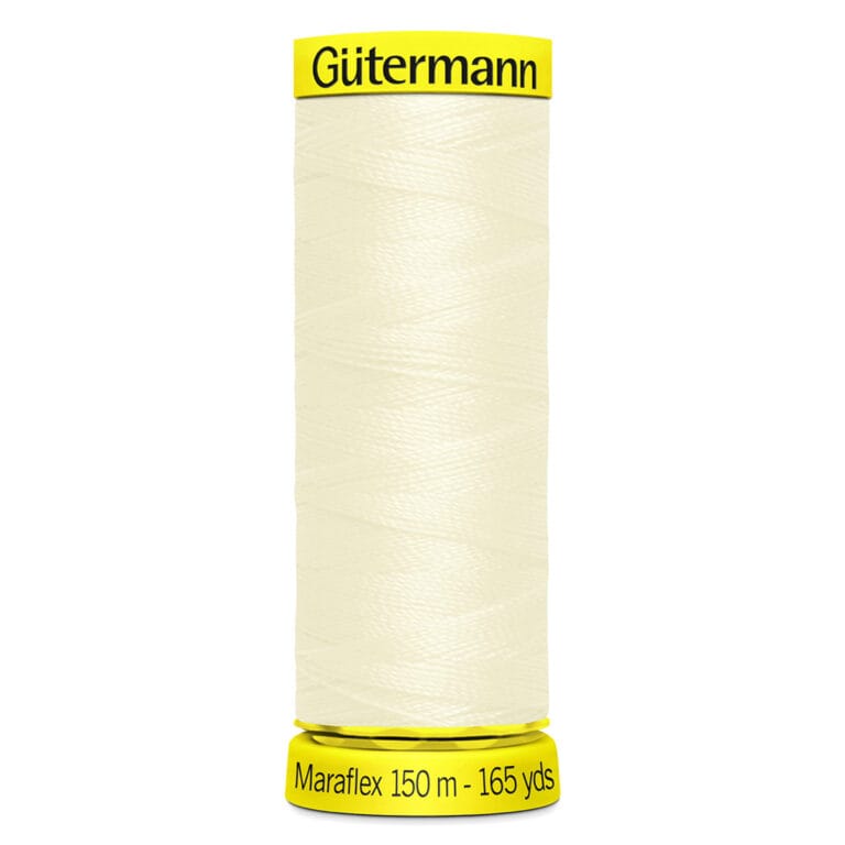 A spool of Gütermann Maraflex thread is shown. The thread is off-white and wrapped around a cylindrical spool. The labels on the top and bottom are yellow, displaying the brand name and length: 150 meters (165 yards).