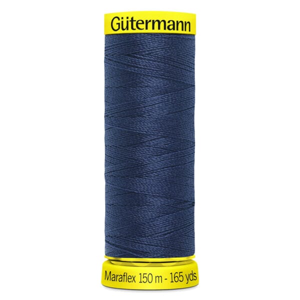 A spool of Gütermann Maraflex navy blue thread, labeled as 150 meters and 165 yards, with bright yellow ends displaying the brand and product details.