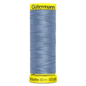 Spool of Gütermann Maraflex thread in light blue, labeled with "150 m - 165 yds" on a yellow base.