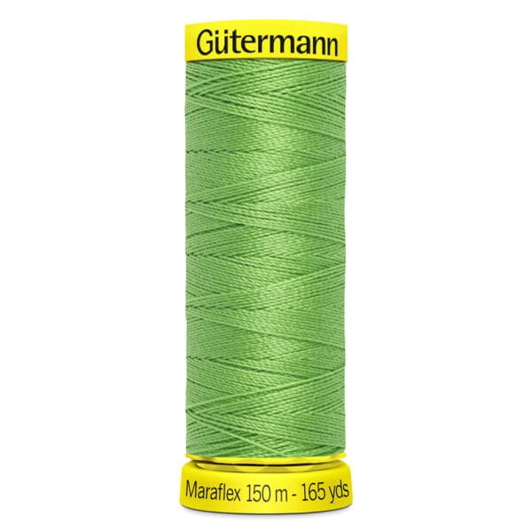 Spool of Gütermann Maraflex green thread, 150 meters (165 yards) long, with yellow labels at top and bottom displaying the brand and length.