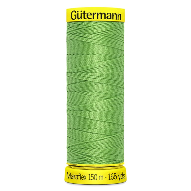 Spool of Gütermann Maraflex green thread, 150 meters (165 yards) long, with yellow labels at top and bottom displaying the brand and length.