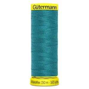 A spool of Gütermann Maraflex sewing thread in teal, labeled with 150 meters or 165 yards. The spool has a yellow top and base with black text.