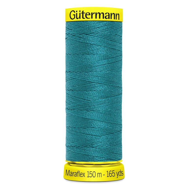 A spool of Gütermann Maraflex sewing thread in teal, labeled with 150 meters or 165 yards. The spool has a yellow top and base with black text.