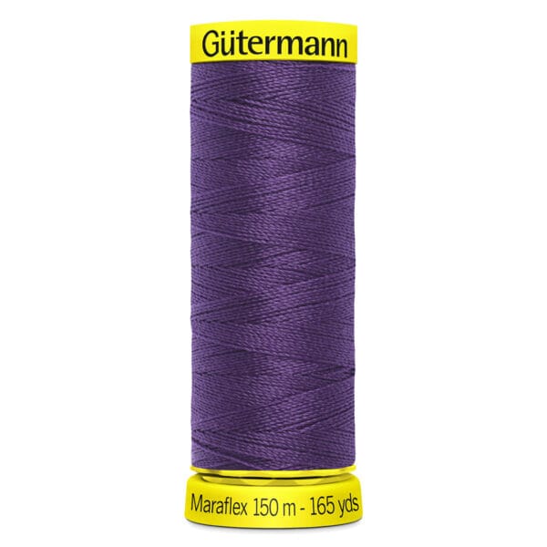 Spool of Gütermann Maraflex thread in deep purple. The label reads "150 m - 165 yds" on a yellow base.