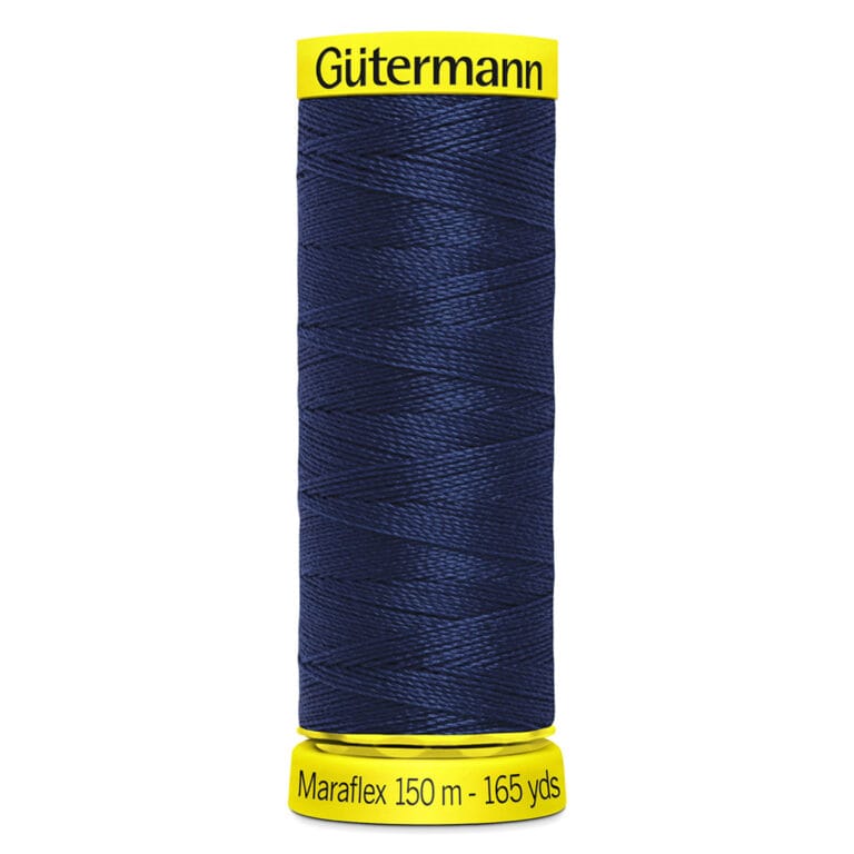A spool of Gütermann Maraflex navy blue sewing thread, 150 meters (165 yards), with yellow labels on top and bottom displaying the brand and length. The thread is tightly wound in a cylindrical shape.