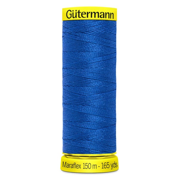 A spool of Gütermann Maraflex thread in royal blue. The label is bright yellow, showing "Gütermann" at the top and "Maraflex 150 m - 165 yds" at the bottom. The thread is neatly wound around the spool.