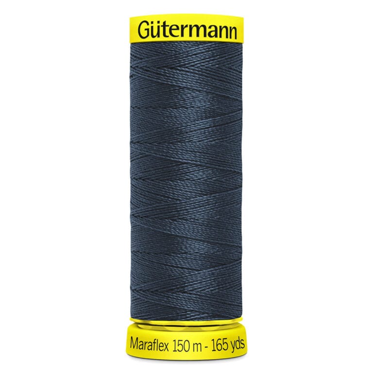 A spool of Gütermann Maraflex thread in dark blue. The spool has yellow labels at the top and bottom, with the text: "Gütermann" on the top label and "Maraflex 150 m - 165 yds" on the bottom label.