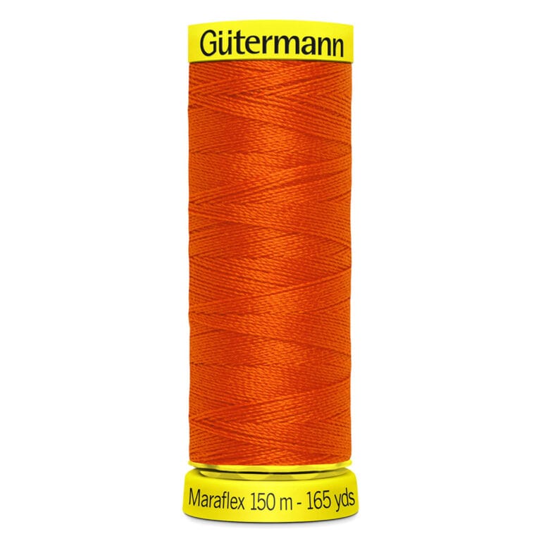 A spool of Gütermann Maraflex thread, colored in vibrant orange, with "150 m - 165 yds" written on the label at the base.