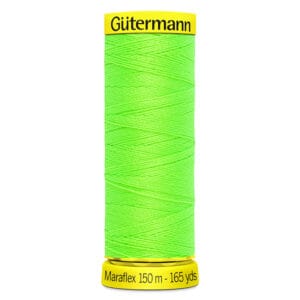 A spool of Gütermann Maraflex thread, featuring neon green color. The spool shows "Gütermann" on the top and "Maraflex 150 m - 165 yds" on the bottom.