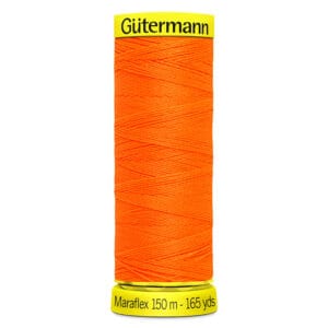 Spool of Gütermann Maraflex sewing thread, bright orange, labeled "150 m - 165 yds.