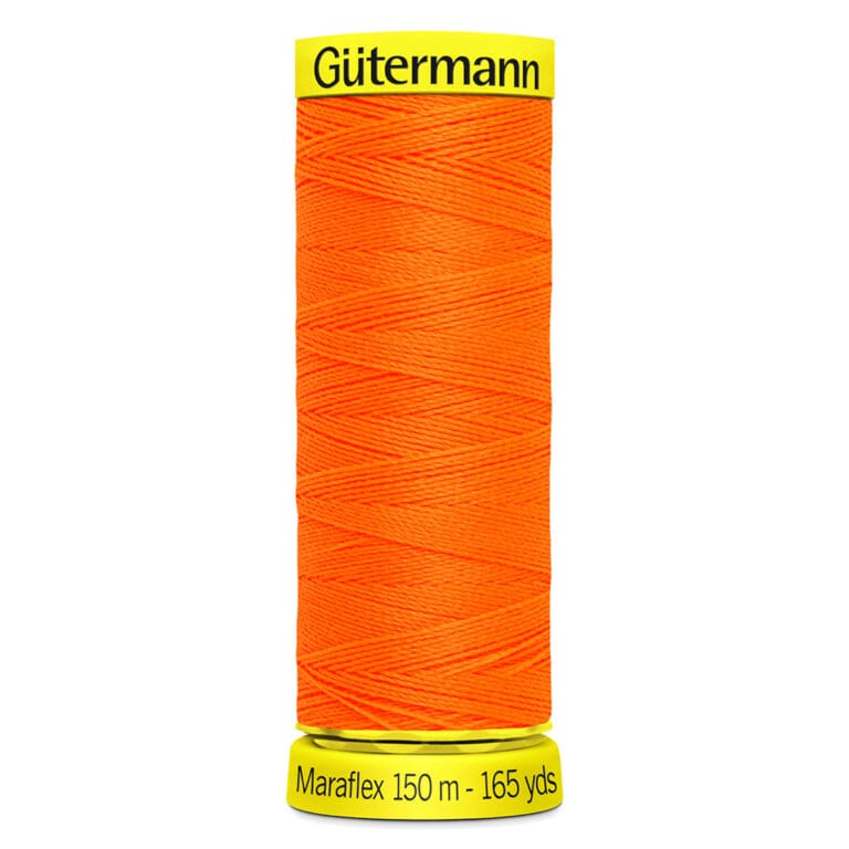 Spool of Gütermann Maraflex sewing thread, bright orange, labeled "150 m - 165 yds.