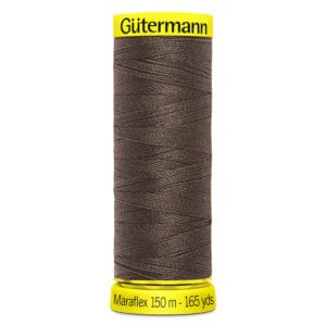 A spool of Gütermann Maraflex brown thread, labeled 150 meters (165 yards), with yellow top and bottom labels.
